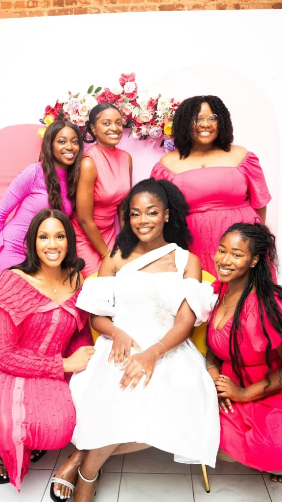 Bride with her friends posing for a photo